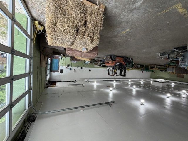 Main warehouse area with full-glass overhead door